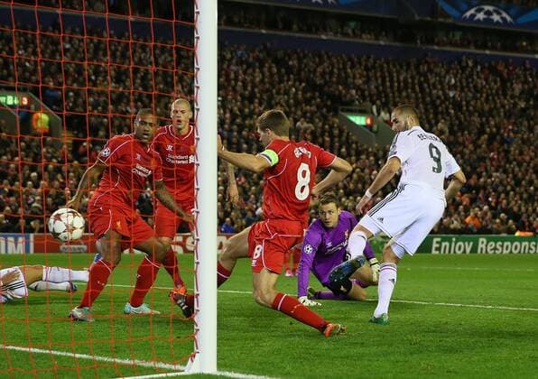 Karim Benzema of Real Madrid scores the third goal his second of the night - UEFA Champions League Group B - Liverpool vs Real Madrid - Anfield Stadium - Liverpool- England - 22nd October 2014 - Picture Simon Bellis Sportimage EDITORIAL USE ONLY. No use with unauthorised audio, video, data, fixture lists, club league logos or live services. Online in-match use limited to 120 images, no video emulation. No use in betting, games or single club league player publications.