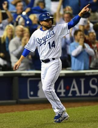 Kansas City Royals second baseman Omar Infante celebrates scoring on teammate Alcides Escobar s double in the second inning against the San Francisco Giants in game 2 of the World Series at Kaufman Stadium in Kansas City, Missouri on October 22, 2014. San Francisco leads the series 1-0 over Kansas City.  KCP2014102226