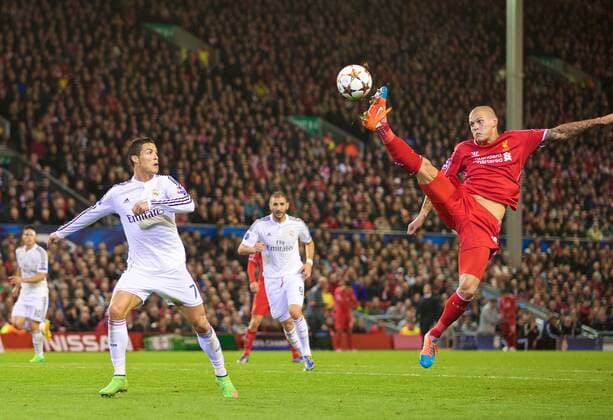 PROPAGANDA20141023 Football - soccer: UEFA Champions League, Liverpool FC - Real Madrid CF, Liverpool s Martin Skrtel and Real Madrid CF s Cristiano Ronaldo during the UEFA Champions League Group B match at Anfield. (Hinweis: Verwendung nur in Deutschland, Österreich oder Schweiz - only Germany, Austria and Switzerland) xHOCHxZWEIx xPropagandax 