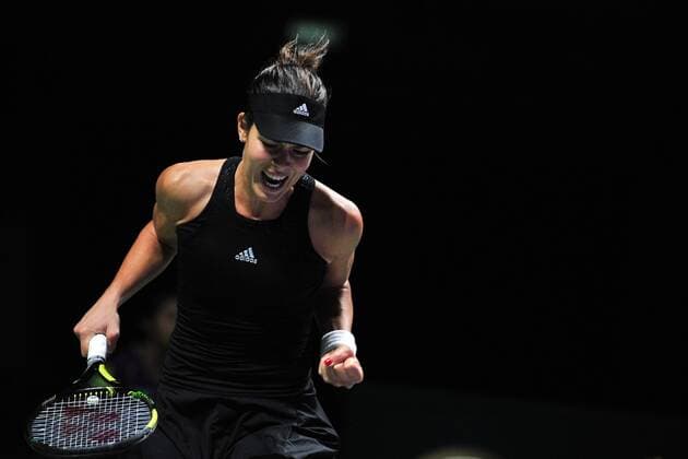 Serbia s Ana Ivanovic reacts during the round robin match at the WTA Tennis Damen Finals at the Singapore Indoor Stadium, Oct. 24, 2014. ) ThenxChihxWey 