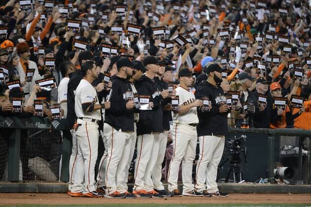 Game 3 of the World Series pauses to recognize Stand Up to Cancer moment as the fans and members of the San Francisco Giants stand honoring cancer victims at AT&T Park in San Francisco on October 24, 2014.  SXP2014102417