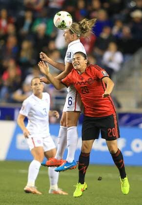 October 24 2014: Whitney Engen (6) of the USA heads over Luz Duarte (20) of Mexico during a CONCACAF Women s World Cup semi-final qualifier at PPL Park, in Chester PA. USA won 3-0. SOCCER: OCT 24 CONCACAF Women s World Cup Qualifier - USA v Mexico Icon25514102406 EDITORIAL USE ONLY
