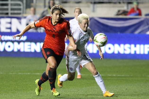 24 October 2014: Alina Garciamendez (MEX) (4) and Megan Rapinoe (USA) (15). The United States Women s National Team played the Mexico Women s National Team at PPL Park in Chester, Pennsylvania in a 2014 CONCACAF Women s Championship semifinal game, which serves as a qualifying tournament for the 2015 FIFA Women s World Cup in Canada. The United States won the game 3-0. With the victory the U.S. advanced to the championship game and qualified for next year s Women s World Cup. SOCCER: OCT 24 CONCACAF Women s World Cup Qualifier - United States v Mexico Icon918141024206 EDITORIAL USE ONLY