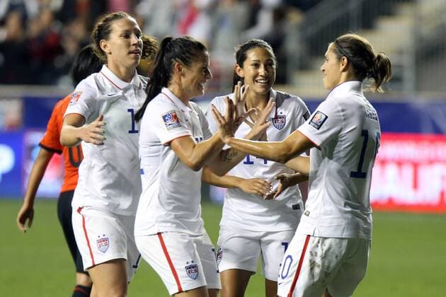24 October 2014: Carli Lloyd (USA) (10) celebrates her second goal with Lauren Holiday (USA) (left), Ali Krieger (USA), and Christen Press (USA) (14). The United States Women s National Team played the Mexico Women s National Team at PPL Park in Chester, Pennsylvania in a 2014 CONCACAF Women s Championship semifinal game, which serves as a qualifying tournament for the 2015 FIFA Women s World Cup in Canada. The United States won the game 3-0. With the victory the U.S. advanced to the championship game and qualified for next year s Women s World Cup. SOCCER: OCT 24 CONCACAF Women s World Cup Qualifier - United States v Mexico Icon918141024207 EDITORIAL USE ONLY