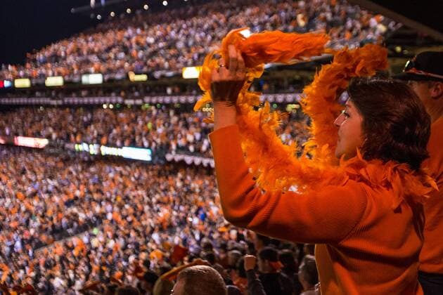October 24, 2014: A fan cheers during game three of the World Series between the San Francisco Giants and the Kansas City Royals at AT&T Park in San Francisco, California, USA. MLB Baseball Herren USA OCT 24 World Series - Royals at Giants - Game 3 Icon20141024029 EDITORIAL USE ONLY