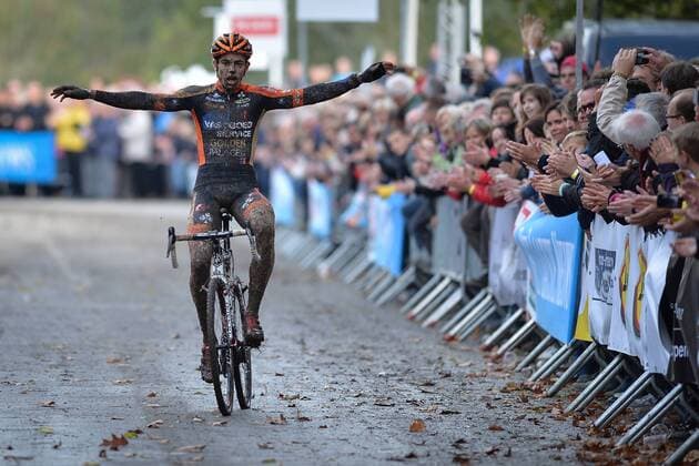 - KRUIBEKE, BELGIUM: Belgian Wout Van Aert celebrates as he crosses the finish line to win the second edition of the Poldercross cyclocross cycling race in Bazel, Kruibeke, Saturday 25 October 2014. DAVIDxSTOCKMAN  04489407