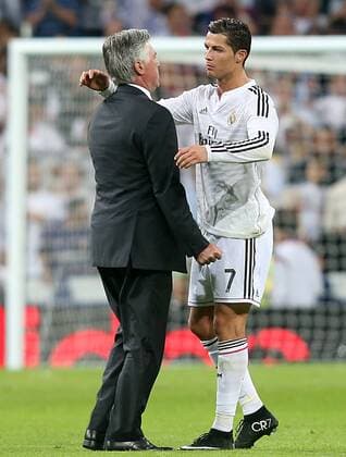 Real Madrid s coach Carlo Ancelotti (l) and Cristiano Ronaldo celebrate the victory in La Liga match.October 25,2014.  (20141025132)
