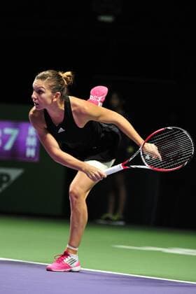 Romania s Simona Halep competes during the women s singles final match of WTA Tennis Damen Finals at the Singapore Indoor Stadium on Oct. 26, 2014. (SP)SINGAPORE-TENNIS-WTA-SINGLES FINAL ThenxChihxWey 