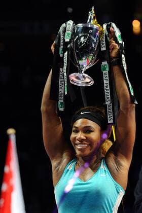 Serena Williams of the United States lifts the trophy during the awarding ceremony after the women s singles final match of WTA Tennis Damen Finals at the Singapore Indoor Stadium on Oct. 26, 2014. (SP)SINGAPORE-TENNIS-WTA-SINGLES FINAL ThenxChihxWey 