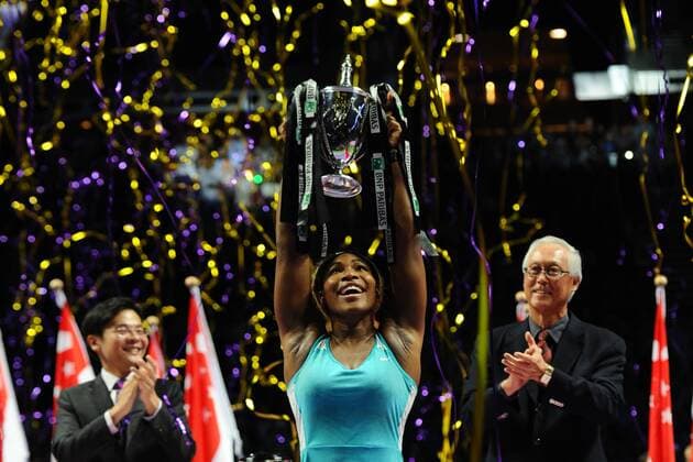 Serena Williams (C) of the United States lifts the trophy during the awarding ceremony after the women s singles final match of WTA Tennis Damen Finals at the Singapore Indoor Stadium on Oct. 26, 2014. (SP)SINGAPORE-TENNIS-WTA-SINGLES FINAL ThenxChihxWey 