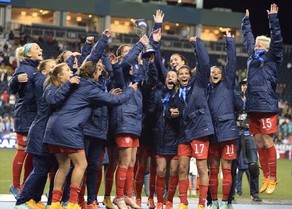 Oct. 26, 2014 - Chester, PA, USA - 20141026 - USA defender Christie Rampone holds up the championship trophy and celebrates with her teammates during the medals ceremony for the CONCACAF women s World Cup qualifying final at PPL Park in Chester, Pa. The USA defeated Costa Rica in the CONCACAF final, 6-0. CHESTER, PA 2014 - USA v Costa Rica women s soccer World Cup Qualifier Final - ZUMAm139