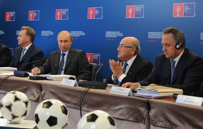 MOSCOW, RUSSIA. OCTOBER 28, 2014. Russia s first deputy prime minister Igor Shuvalov, Russia s president Vladimir Putin, FIFA International Federation of Association Football president Joseph Sepp Blatter and Russia s minister Vitaly Mutko (L-R) at a meeting of the Supervisory Board of the Russia-2018 FIFA World Cup Organizing Committee. Mikhail Klimentyev TASS  RE15334C