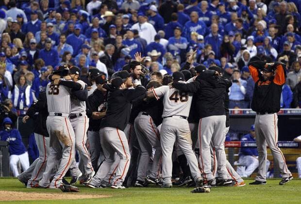 The San Francisco Giants celebrate their win after game 7 of the World Series against the Kansas City Royals at Kauffman Stadium in Kansas City, Missouri on October 29, 2014. The Giants defeated the Royals 3-2 to win the World Series.  KCP20141029216