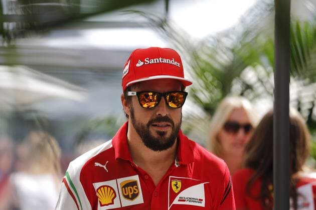 Oct. 30, 2014 - Austin, United States of America - FERNANDO ALONSO of Spain and Scuderia Ferrari is seen in the paddock during preparations of the Formula 1 United States Grand Prix 2014 at Circuit of the Americas in Austin, Texas, United States of America. F1 2014 - United States Grand Prix - Preparations. - ZUMAg147