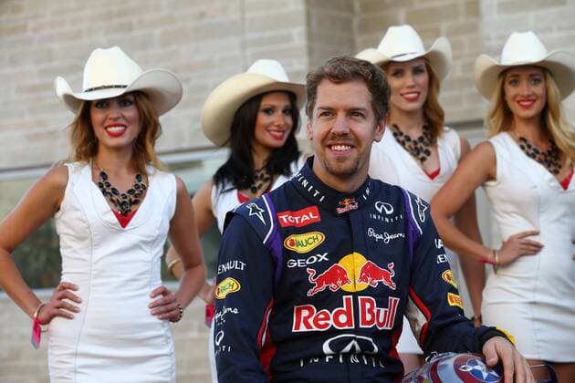 02.11.2014 - Sebastian Vettel (GER) Red Bull Racing RB10 with Grid Girls United States Grand Prix, Austin 30 October - 2 November 2014 