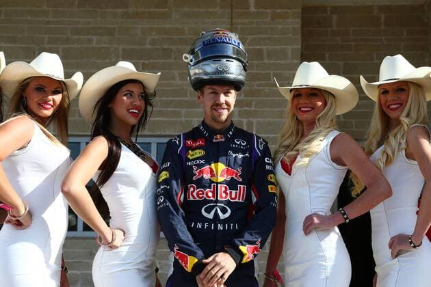 02.11.2014 - Sebastian Vettel (GER) Red Bull Racing RB10 with Grid Girls United States Grand Prix, Austin 30 October - 2 November 2014 