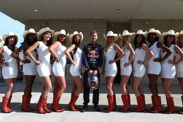 02.11.2014 - Sebastian Vettel (GER) Red Bull Racing RB10 with Grid Girls United States Grand Prix, Austin 30 October - 2 November 2014 
