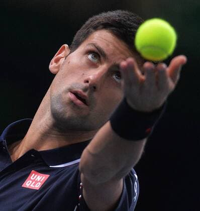 (141103) -- PARIS, Nov. 2, 2014 -- Novak Djokovic of Serbia serves during the men s singles final match at the ATP Tennis Herren World Tour Masters 1000 indoor tennis tournament at the Bercy Palais-Omnisport in Paris, France, Nov. 2, 2014. ChenxXiaowei 