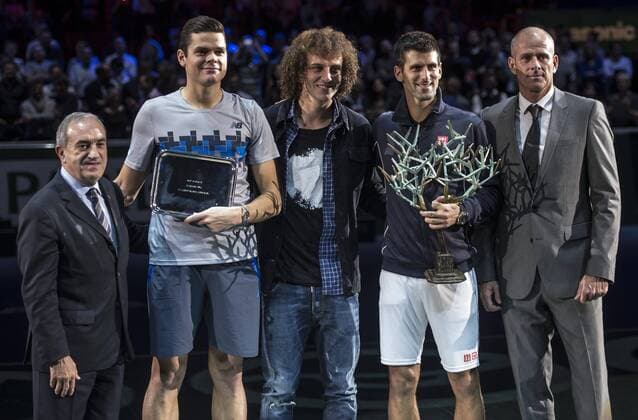 (141103) -- PARIS, Nov. 2, 2014 -- Novak Djokovic (2nd R) of Serbia, Milos Raonic (2nd L) of Canada, Guy Forget (R) and Paris St Germain s David Luiz (C) pose for photograph during the awarding ceremony after the men s singles final match at the ATP Tennis Herren World Tour Masters 1000 indoor tennis tournament at the Bercy Palais-Omnisport in Paris, France, Nov. 2, 2014. Novak Djokovic won 2-0 to claim the champion. ) (SP)FRANCE-PARIS-TENNIS-ATP-MASTERS ChenxXiaowei 