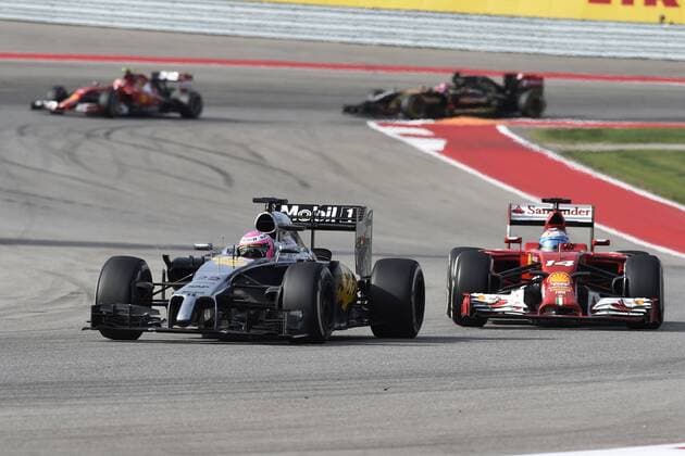 Motorsports: FIA Formula One World Championship 2014, Grand Prix of United States, 22 Jenson Button (GBR, McLaren Mercedes), 14 Fernando Alonso (ESP, Scuderia Ferrari), xHOCHxZWEIx