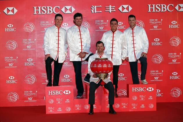 (From left) Justin Rose of England, Bubba Watson of the United States, Adam Scott of Australia, Rickie Fowler of the United States and Martin Kaymer of Germany, all dressed in Chinese folk costumes tangzhuang, pose at the opening ceremony of the WGC HSBC Champions golf tournament on the Bund in Shanghai, China, 4 November 2014. Golfers tee off HSBC Champions golf tournament in Shanghai  20141104_34386