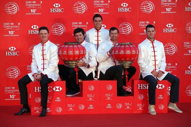 (From left) Justin Rose of England, Bubba Watson and Rickie Fowler of the United States, Adam Scott of Australia and Martin Kaymer of Germany, all dressed in Chinese folk costumes tangzhuang, pose at the opening ceremony of the WGC HSBC Champions golf tournament on the Bund in Shanghai, China, 4 November 2014. Golfers tee off HSBC Champions golf tournament in Shanghai  20141104_84987