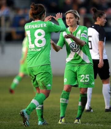 SOCCER - CL, Neulengbach vs Wolfsburg NEULENGBACH,AUSTRIA,09.NOV.14 - SOCCER - UEFA Champions League, Women, NOESV Neulengbach vs VfL Wolfsburg. Image shows the rejoicing of Vanessa Bernauer and Martina Mueller (Wolfsburg). 