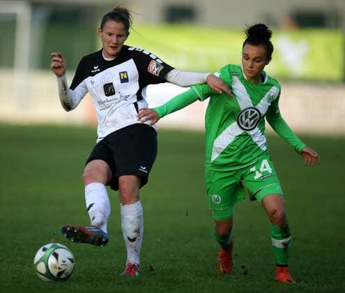 SOCCER - CL, Neulengbach vs Wolfsburg NEULENGBACH,AUSTRIA,09.NOV.14 - SOCCER - UEFA Champions League, Women, NOESV Neulengbach vs VfL Wolfsburg. Image shows Lucie Harsanyova (Neulengbach) and Lina Magull (Wolfsburg). 