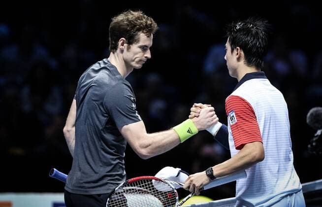 Kei Nishikori (R) of Japan shakes hands with Andrew - Andy - Murray of Britain during the ATP Tennis Herren World Tour Finals Group B match in London, Britain, on Nov. 9, 2014. (SP)BRITAIN-LONDON-TENNIS-ATP WORLD TOUR FINALS TangxShi 