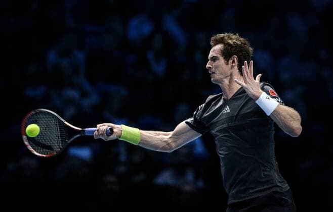 Andrew - Andy - Murray of Britain hits a return during the ATP Tennis Herren World Tour Finals Group B match in London, Britain, on Nov. 9, 2014. (SP)BRITAIN-LONDON-TENNIS-ATP WORLD TOUR FINALS TangxShi 