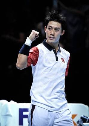 Kei Nishikori of Japan celebrates after winning the ATP Tennis Herren World Tour Finals Group B match in London, Britain, on Nov. 9, 2014. (SP)BRITAIN-LONDON-TENNIS-ATP WORLD TOUR FINALS TangxShi 