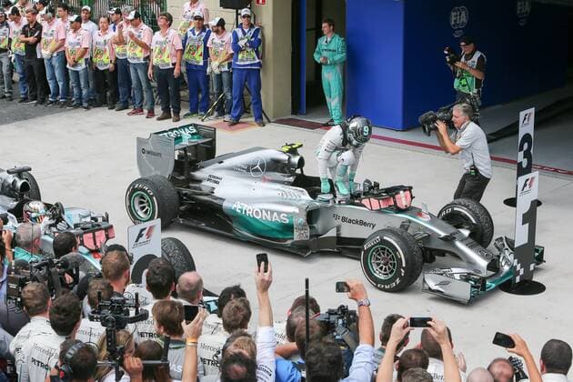 Mercedes driver Nico Rosberg gets off the car after the Brazilian Formula One Grand Prix in Sao Paulo, Brazil, on Nov. 9, 2014. ) (SP)BRAZIL-SAO PAULO-F1-GRAND PRIX XuxZijian 