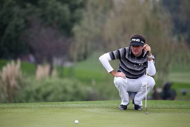 Bubba Watson of the United States considers a putt during the WGC HSBC Champions golf tournament at the Sheshan International Golf Club in Shanghai, China, 9 November 2014. Even in the midst of a meltdown, Bubba Watson never lost hope Sunday (9 November 2014) in the HSBC Champions. He stood on the 16th tee with a two-shot lead. He trudged off the 17th green facing a one-shot deficit behind five players suddenly tied for the lead. And right when it looked as though Watson had blown it, he delivered a finish that not even the creator of ¡°Bubba golf¡± could have imagined. From some 60 yards away in a bunker left of the green on the par-5 18th hole, Watson blasted out of the sand and watched his ball roll 25 feet before it dropped for eagle. Watson was so stunned that his eyes widened and he screamed. He didn¡¯t know what else to do. Moments later, he rolled in a 20-foot birdie putt on the 18th in a playoff to beat Tim Clark and captured his first World Golf Championship. Bubba Watson wins his 1st World Golf Championship in Shanghai  pbu184838_16