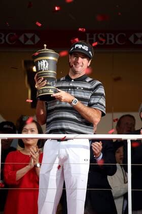 Bubba Watson of the United States celebrates with his champion trophy during the award ceremony of the WGC HSBC Champions golf tournament at the Sheshan International Golf Club in Shanghai, China, 9 November 2014. Bubba Watson wins his 1st World Golf Championship in Shanghai  pbu184836_05