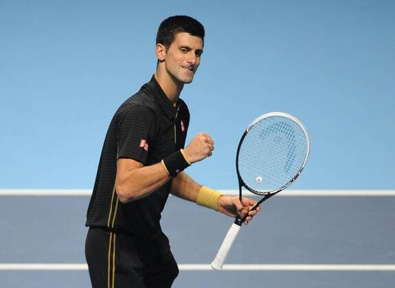 Tennis - 2014 ATP Tennis Herren World Tour Finals at The 02 - Day Two Group A Singles: Novak Djokovic celebrates his win in straight sets 