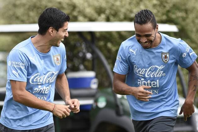 Luis Suarez (L) and Alvaro Pereira of Uruguay s national soccer team, take part in a training session at the Uruguay Celeste complex in Montevideo, capital of Uruguay, on Nov. 10, 2014. Uruguay s national soccer team will meet Costa Rica in a friendly match on Nov. 12. Nicolas Celaya) (da) (SP)URUGUAY-MONTEVIDEO-SOCCER-NATIONAL TEAM e NICOLASxCELAYA 
