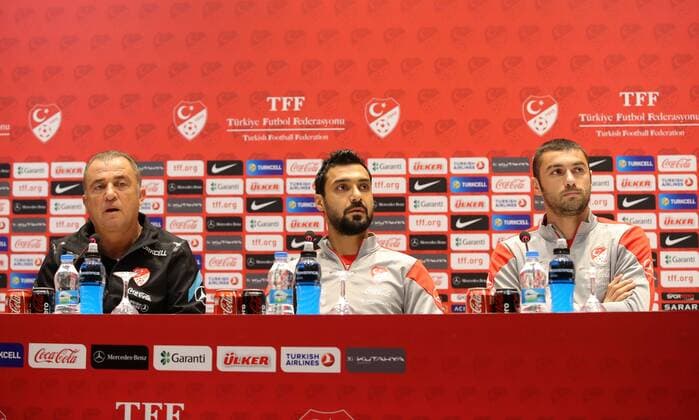 Turkey National Football Team Head Coach Fatih Terim and Players Bekir Irtegun (C) and Burak Yilmaz (R) during the press conference in Riva, Istanbul on November 11, 2014. 
