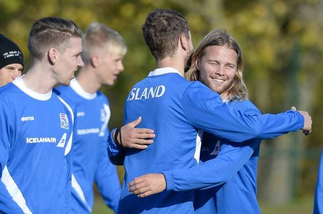 - BRUSSELS, BELGIUM: Iceland s Birkir Bjarnason pictured giving a hug during a training session of Iceland s national soccer team, in Brussels, Tuesday 11 November 2014. Iceland will play on Wednesday a friendly game against Belgian national soccer team Red Devils. LAURIExDIEFFEMBACQ  premiumd 20150463
