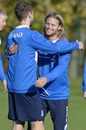 - BRUSSELS, BELGIUM: Iceland s Birkir Bjarnason pictured giving a hug during a training session of Iceland s national soccer team, in Brussels, Tuesday 11 November 2014. Iceland will play on Wednesday a friendly game against Belgian national soccer team Red Devils. LAURIExDIEFFEMBACQ  premiumd 20150464