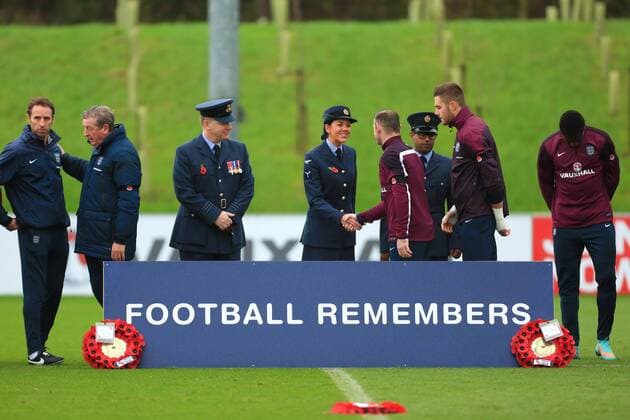 Roy Hodgson, England manager and Wayne Rooney join service personnel for two minutes silence - England Training & Press Conference - UEFA Euro 2016 Qualifying - St George s Park - Burton-upon-Trent - 11 11 2014 Pic Philip Oldham Sportimage EDITORIAL USE ONLY. No use with unauthorised audio, video, data, fixture lists, club league logos or live services. Online in-match use limited to 120 images, no video emulation. No use in betting, games or single club league player publications.