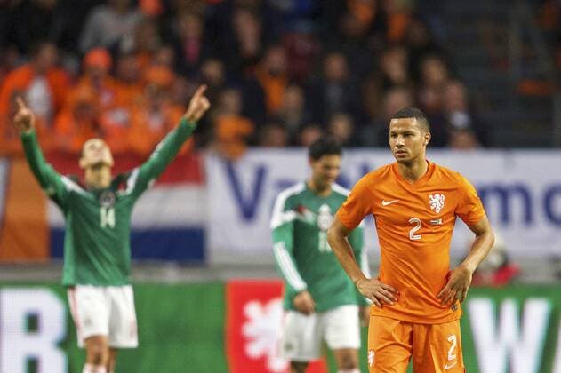 (L-R) Carlos Vela of Mexico, Andres Guardado of Mexico, Ricardo van Rhijn of Holland during the International friendly match between Netherlands and Mexico on November 12, 2014 at the Amsterdam Arena in Amsterdam, The Netherlands. Netherlands v Mexico International Friendly 2014 2015 xVIxxIVx 3268371