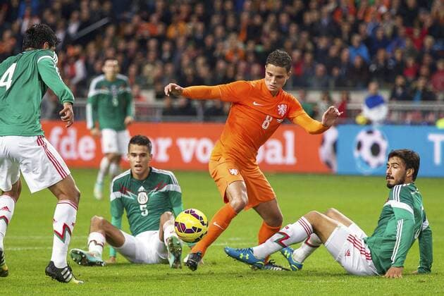 (L-R) Miguel Angel Herrera of Mexico, Diego Reyes of Mexico, Ibrahim Afellay of Holland, Oswaldo Alanis Pantoja of Mexico during the International friendly match between Netherlands and Mexico on November 12, 2014 at the Amsterdam Arena in Amsterdam, The Netherlands. Netherlands v Mexico International Friendly 2014 2015 xVIxxIVx 3268697