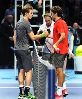 Tennis - 2014 ATP Tennis Herren World Tour Finals at The O2 - Day five, Group B Singles: Andy Murray is consoled by Roger Federer at the net after the match 