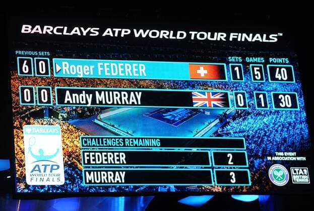 Tennis - 2014 ATP Tennis Herren World Tour Finals at The O2 - Day five, Group B Singles: The scoreboard shows Andy Murray crashing out 6 - 0 6- 1 by roger Federer 