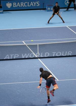 Tennis - 2014 ATP Tennis Herren World Tour Finals at The O2 - Day Three, Group A Novak Djokovic and Tomas Berdych 