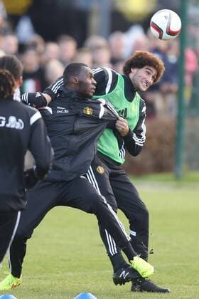 - BRUSSELS, BELGIUM: Belgium s Christian Benteke and Belgium s Marouane Fellaini fight for the ball during a training session of Belgian national soccer team Red Devils, Saturday 15 November 2014, in Neerpede, Brussels. Belgium will play its third game of the Euro 2016 qualification against Wales on Sunday. BRUNOxFAHY  xpremiumd kur20240133x