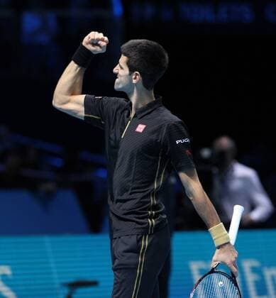 TENNIS - ATP, World Tour Finals 2014 LONDON,ENGLAND,15.NOV.14 - TENNIS - ATP Tennis Herren World Tour, World Tour Finals 2014. Image shows the rejoicing of Novak Djokovic (SRB). 