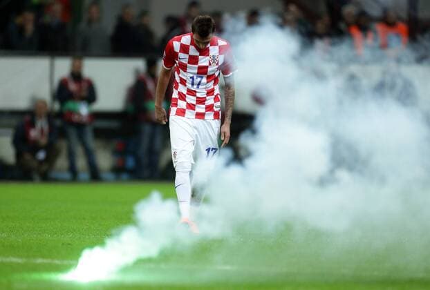 16.11.2014, Stadio Giuseppe Meazza, Milan, Italy - 15th UEFA European Championship, qualifying round, group H, Italy - Croatia. The referee stopped the action when a number of flares ended up on the playing surface. Mario Mandzukic.  MarkoxLukunic PIXSELL