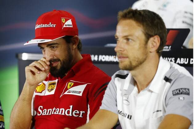 Motorsports: FIA Formula One World Championship 2014, Grand Prix of Abu Dhabi, 14 Fernando Alonso (ESP, Scuderia Ferrari), 22 Jenson Button (GBR, McLaren Mercedes), xHOCHxZWEIx
