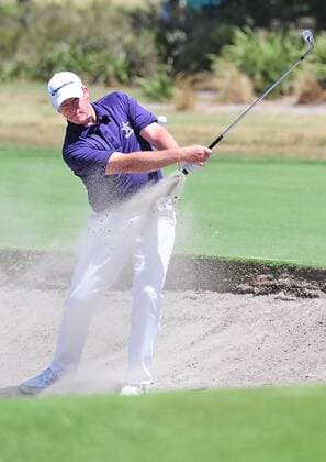 Nov. 21, 2014 - Melbourne, Victoria, Australia - Marcus Fraser (AUS) plays a shot out of the bunker on the seventh green during day 2 of the 2014 Australian Masters at The Metropolitan Golf Club in Melbourne, Australia. Golf 2014 - Australian Masters Day 2 - ZUMAk106